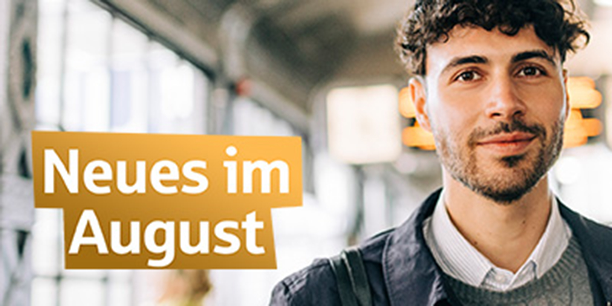 Neues im August: Mann in einer Bahnhofshalle
